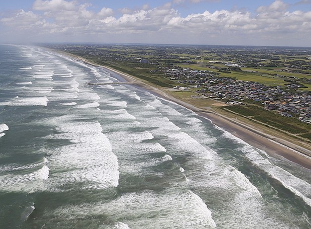 An aerial photo shows white waves crashing onto the Kujukuri Coast in Sosa City, Chiba Prefecture on Wednesday.
Mandatory Credit:	Toshiyuki Kon/The Yomiuri Shimbun/AP via CNN Newsource