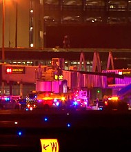 Emergency crews on the scene at Minneapolis-Saint Paul International Airport after a Delta Air Line flight made an emergency landing.
Mandatory Credit:	WCCO via CNN Newsource