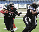 Ja’Mesha “Jam” Worthington (31) of Richmond’s undefeated Black Widows women’s tackle football team runs the ball during the national championship game against the Oklahoma Rage on Saturday, July 26.