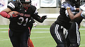 Ja’Mesha “Jam” Worthington (31) of Richmond’s undefeated Black Widows women’s tackle football team runs the ball during the national championship game against the Oklahoma Rage on Saturday, July 26.