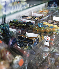 Glass pipes on display at 3 Stars Vape & Tobacco on Lakeside Avenue, pictured Wednesday, July 30. The shop is among many across Richmond area. City officials have moved to curb the spread of new tobacco and hemp retailers through stricter zoning rules.