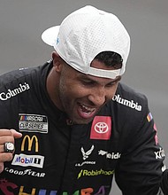 Bubba Wallace reacts after winning a NASCAR Cup Series auto race at Indianapolis Motor Speedway, Sunday, July 27, 2025, in Indianapolis.