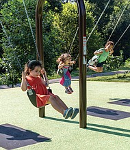 Children and families enjoyed the swingset and other features following the ceremony.