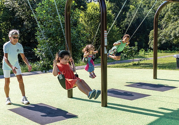 Children and families enjoyed the swingset and other features following the ceremony.