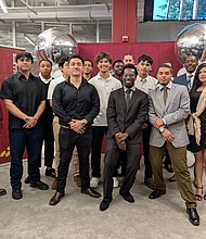 The 44th cohort of Overhead Electric Line Workers program participants celebrated completing the program. Photo provided by City Colleges of Chicago.