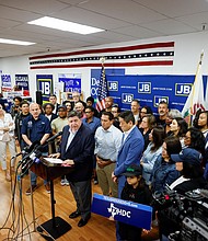 Illinois Governor J.B. Pritzker speaks in front of Democratic lawmakers from Texas during a press conference, after they left their state to deny Republicans the quorum needed to redraw the state's 38 congressional districts, in Carol Stream, Illinois, on August 3, 2025.
Mandatory Credit:	Kamil Krzaczynski/Reuters via CNN Newsource
