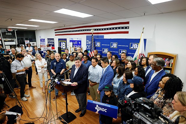 Illinois Governor J.B. Pritzker speaks in front of Democratic lawmakers from Texas during a press conference, after they left their state to deny Republicans the quorum needed to redraw the state's 38 congressional districts, in Carol Stream, Illinois, on August 3, 2025.
Mandatory Credit:	Kamil Krzaczynski/Reuters via CNN Newsource