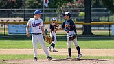Aiki Uchida, of Saitama Japan Little League and Andrew McKetta of Richmond Little League chat on the field Monday, Aug. 4 during interleague games held as part of the Richmond Little League Sister City Baseball Exchange.