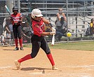 Ta’mya Kiefer (7) of the Rocky Mount Raiders softball team from North Carolina steps up to bat against the USZ Angels in the 18U division of the Metropolitan Junior Baseball League’s 34th annual championships on Sunday, Aug. 3.
