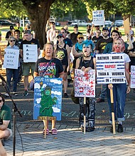 Dozens of protestors attend the “Rage Against the Regime” event, organized by 50501VA and Punks 4 Liberation on Saturday Aug. 2. It featured death metal, grindcore, indie rock and hardcore music, along with speakers opposing the Trump administration.