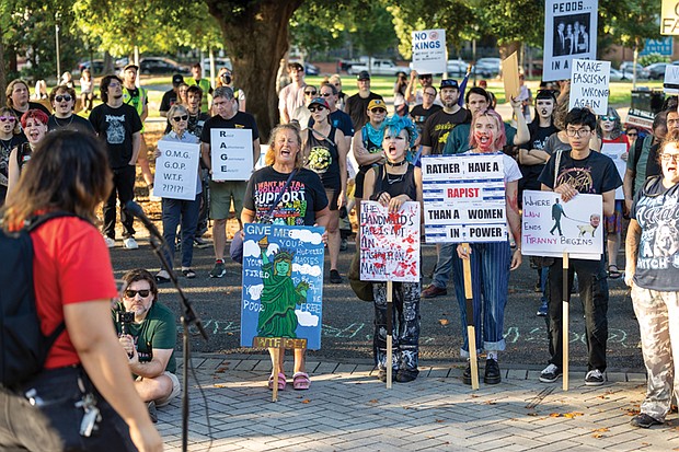 Dozens of protestors attend the “Rage Against the Regime” event, organized by 50501VA and Punks 4 Liberation on Saturday Aug. 2. It featured death metal, grindcore, indie rock and hardcore music, along with speakers opposing the Trump administration.