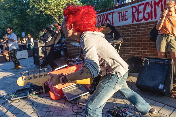 Brick, bassist for the band Lay Waste, performs during the event.
