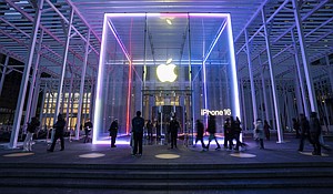 People walk by the Apple Store on Fifth Avenue on February 24 in New York City. Apple is investing another $100 billion to expand its operations in the United States, President Donald Trump will announce later August 6, a White House official said.
Mandatory Credit:	Craig T Fruchtman/Getty Images via CNN Newsource