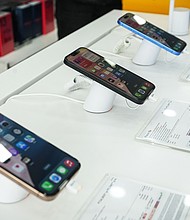 Apple's iPhone 16 series are displayed for sale at an electronics store in Srinagar, Jammu and Kashmir, on April 17.
Mandatory Credit:	Firdous Nazir/NurPhoto/Getty Images via CNN Newsource