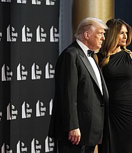 President Donald Trump and first lady Melania Trump arrive to view opening night of "Les Miserables," at the Kennedy Center on June 11 in Washington, DC.
Mandatory Credit:	Alex Brandon/AP via CNN Newsource