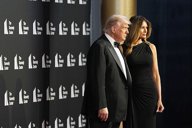 President Donald Trump and first lady Melania Trump arrive to view opening night of "Les Miserables," at the Kennedy Center on June 11 in Washington, DC.
Mandatory Credit:	Alex Brandon/AP via CNN Newsource