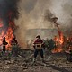 Firefighters battle a wildfire in Trancoso, Portugal, on August 11.
Mandatory Credit:	Patricia de Melo Moreira/AFP/Getty Images via CNN Newsource