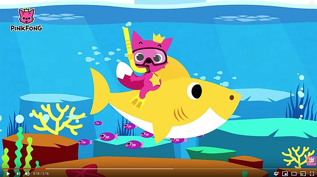 Baby Shark with Pinkfong's mascot The Pink Fox, also named "Pinkfong," frequently appears in their videos.
Mandatory Credit:	Pinkfong! Kids' Songs & Stories/Youtube via CNN Newsource