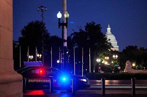 A law enforcement vehicle stands in front of Union Station near the US Capitol in Washington, DC, on Monday.
Mandatory Credit:	Ken Cedeno/Reuters via CNN Newsource