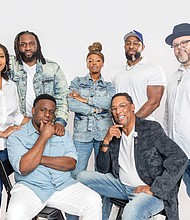 Cast members of the stage play “Father Figure” gather ahead of its Aug. 23 performance
at St. Paul’s Baptist Church North in Richmond. The playwright, Garrett Davis, is seated
at right.