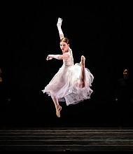 Cassidy Isaacson and Smuin dance company artists perform in “Wild Sweet Love,” by Trey McIntyre. Courtesy Smuin Contemporary Ballet.