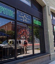 Capitol Smoke Richmond’s storefront on Broad Street. City officials and shop owners
are weighing next steps for regulating tobacco and hemp stores after new restrictions
were approved.
