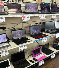 An EZPawn in Austin, Texas. Pawnshop owners told CNN they are seeing more Americans coming in for back-to-school essentials.
Mandatory Credit:	Courtesy Scott Sundheim via CNN Newsource
