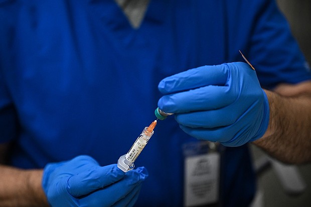 Caption:	A health worker prepares a dose of the measles vaccine at a health center in Lubbock, Texas, on February 27. The measles outbreak centered in West Texas – one of the largest and deadliest in centuries – has ended, state health officials announced on August 18.
Mandatory Credit:	Ronaldo Schemidt/AFP/Getty Images via CNN Newsource