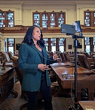 State Rep. Nicole Collier talks on the phone from the floor of the House, where she has chosen to remain until Wednesday, after Democratic lawmakers who had left the state to prevent Republicans from redrawing Texas’s 38 congressional districts returned to the Capitol in Austin, Texas, on August 18, 2025.
Mandatory Credit:	Gene Wu/Handout/Reuters via CNN Newsource