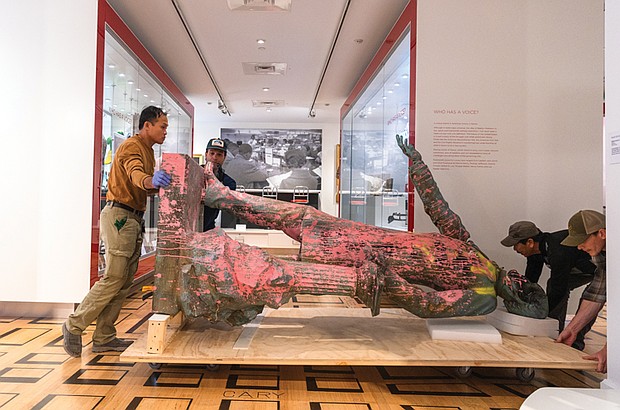 The Valentine removed the Jefferson Davis statue from its exhibition, “This Is Richmond, Virginia,” on Tuesday, Aug. 19, preparation for a loan to the Museum of Contemporary Art in Los Angeles for an upcoming exhibition. The statue, which had been on view since 2022, will remain part of The Valentine’s collection. Bonsai Fine Arts Handling assisted with the removal. “We’re so glad it is going to be shown to a new community and to see how Californians respond,” said Christina K. Vida, Elise H. Wright curator of general collections at The Valentine. During its three years on display, The Valentine collected more than 7,000 responses from a public survey on monuments and public art and plans to compile the feedback for a discussion event, comparing it with survey results from California while the statue is on display there. The statue will remain in its current condition, laid on its side with paint splatters, remnants of a 2020 toilet paper noose, a tear in its arm, and uric acid stains. “We really wanted to make sure that this piece was not ever going to be used to perpetuate the myth of the Lost Cause, and so by having it displayed in its 2020 state we can ensure that it helps undo some of the damage it did for so long here in Richmond,” Vida said.