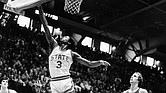 Clyde Austin soars near the rim during his playing days at North Carolina State University in the late 1970s.