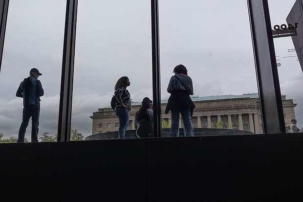 People wait to enter the Smithsonian National Museum of African American History and Culture in Washington, DC. President Trump has said he will review exhibits for alleged bias.
Mandatory Credit:	Andrew Lichtenstein/Corbis/Getty Images via CNN Newsource