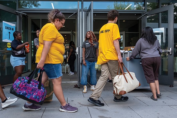 Students with their help of family check in to the Gladding Residence Center on the campus of VCU on Saturday August 16, 2025. Sandra Sellars/Richmond Free Press