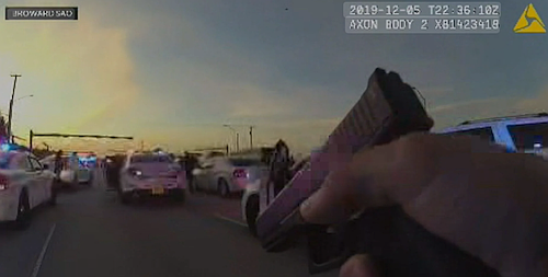 New dramatic video shows the rush-hour shootout between police and two armed robbery suspects at Flamingo and Miramar Parkway that …