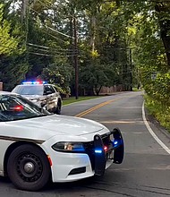 An FBI agent work outside the home of John Bolton in Bethesda, Maryland, on Friday,
Mandatory Credit:	Andrew Harnik/Getty Images via CNN Newsource