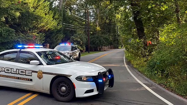 An FBI agent work outside the home of John Bolton in Bethesda, Maryland, on Friday,
Mandatory Credit:	Andrew Harnik/Getty Images via CNN Newsource
