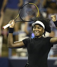 Venus and her sister Serena won 14 doubles titles as a team at grand slams.
Mandatory Credit:	Bernie Nunez/Getty Images via CNN Newsource