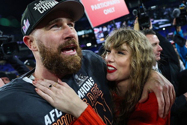 Travis Kelce and Taylor Swift are pictured together after the AFC Championship game in 2024. Taylor Swift and Travis Kelce’s relationship is going from “so high school” to officially engaged.
Mandatory Credit:	Patrick Smith/Getty Images via CNN Newsource