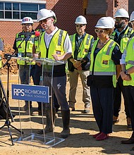Patrick Harrel, RPS’s new chief operating officer, speaks to the media on Friday, Aug.
22, during a tour of the new Richmond High School for the Arts.