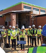 Richmond Public School board member Stephanie Rizzi speaks to the media Friday, Aug. 22 during a tour of the Richmond High School for the Arts.