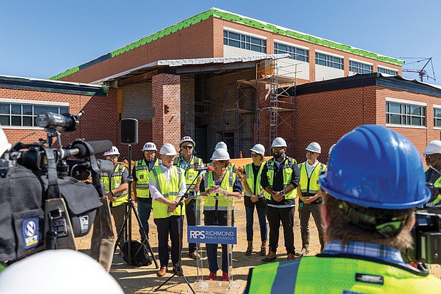 Richmond Public School board member Stephanie Rizzi speaks to the media Friday, Aug. 22 during a tour of the Richmond High School for the Arts.
