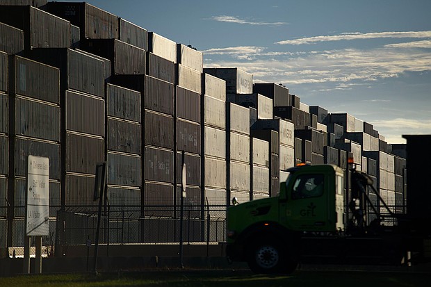 Shipping containers are pictured at the port of Houston in Seabrook, Texas, on October 4, 2024. Nearly half of businesses surveyed by the Dallas Fed said they’ve been hurt by higher tariffs this year.
Mandatory Credit:	Mark Felix/Bloomberg/Getty Images via CNN Newsource