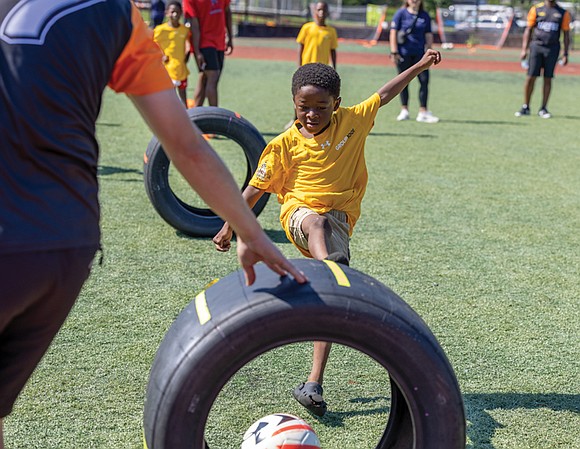 At an event hosted by the Cal Ripken Sr. Foundation with sponsor Gainbridge, participants rotated through skill stations for passing, … At an event hosted by the Cal Ripken Sr. Foundation with sponsor Gainbridge, participants rotated through skill stations for passing, …