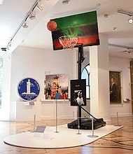 The basketball hoop and ball used during 2020 Lee Circle gatherings are on display at The Valentine as part of the “This Is Richmond, Virginia,” exhibition.