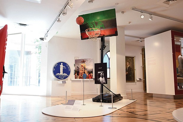 The basketball hoop and ball used during 2020 Lee Circle gatherings are on display at The Valentine as part of the “This Is Richmond, Virginia,” exhibition.