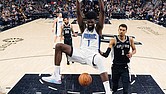 Orlando Magic forward Jonathan Isaac scores past San Antonio Spurs center Victor
Wembanyama during the first half Wednesday, Jan. 31, 2024. Isaac wears a version of
his shoe, the Unitus Judah 1.