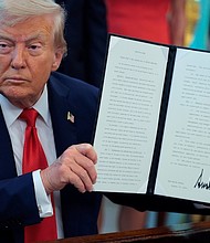President Donald Trump signs executive orders in the Oval Office at the White House on August 25 in Washington, DC. Trump wants to eliminate “cashless bail” in the nation’s capital and across the country.
Mandatory Credit:	Chip Somodevilla/Getty Images via CNN Newsource