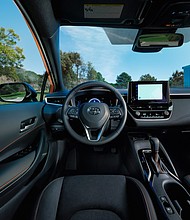 behind the wheel of the 2026 Toyota Corolla Hatchback FX