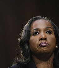 Lisa Cook at her 2023 Senate confirmation hearing. A Trump administration official has announced a new criminal referral regarding a property she received a mortgage for in Massachusetts, part of the administration's effort to remove her from the Fed's Board of Governors.
Mandatory Credit:	Drew Angerer/Getty Images via CNN Newsource