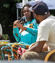 Michael Carter Jr., a fifth-generation farmer, speaks on the Black Farmers Panel, “Everybody Gotta Eat.” “What you’re experiencing right now, Happily Natural Day, should be your every day. Every day you should be looking to support Black businesses, Black farmers and Black communities,” Carter said.
